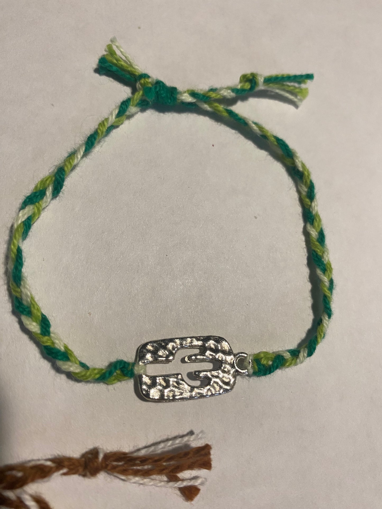 adjustable string bracelets
